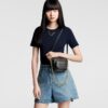 louis-vuitton-mini-bumbag-monogram-empreinte-handbags-M46917_PM1_Wornview.jpg Louis Vuitton Mini Bumbag