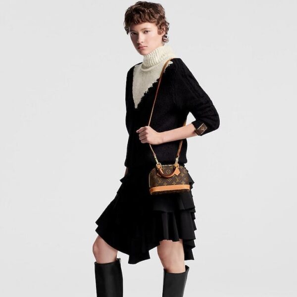 louis-vuitton-nano-alma-monogram-wallets-and-small-leather-goods-M82717_PM1_Croppedwornview.jpg Louis Vuitton Nano Alma
