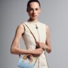 louis-vuitton-nano-speedy-other-monogram-canvas-wallets-and-small-leather-goods-M11212_PM1_Wornview.jpg Louis Vuitton Nano Speedy