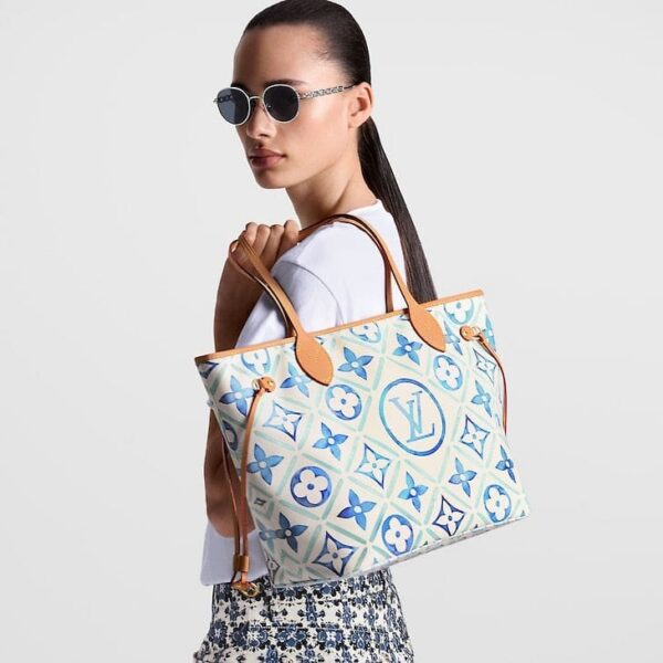 louis-vuitton-neverfull-mm-exclusively-online-other-monogram-canvas-handbags-M11263_PM1_Wornview.jpg Louis Vuitton Neverfull MM