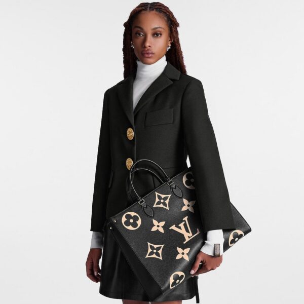 louis-vuitton-onthego-gm-bicolor-monogram-empreinte-leather-handbags-M45945_PM1_Croppedwornview.jpg Louis Vuitton Onthego PM