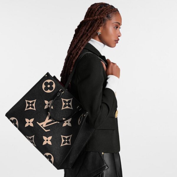 louis-vuitton-onthego-gm-bicolor-monogram-empreinte-leather-handbags-M45945_PM1_Wornview.jpg Louis Vuitton Onthego PM