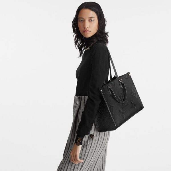 louis-vuitton-onthego-mm-monogram-empreinte-handbags-M45595_PM1_Wornview.jpg Louis Vuitton OnTheGo MM