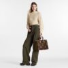 louis-vuitton-onthego-mm-monogram-handbags-M45321_PM1_Croppedwornview.jpg Louis Vuitton OnTheGo MM