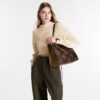 louis-vuitton-onthego-mm-monogram-handbags-M45321_PM1_Wornview.jpg Louis Vuitton OnTheGo MM