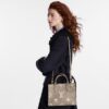 louis-vuitton-onthego-pm-bicolor-monogram-empreinte-leather-handbags-M45779_PM1_Croppedwornview.jpg Louis Vuitton Onthego PM Onthego PM