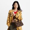 louis-vuitton-onthego-pm-monogram-canvas-handbags-M46373_PM1_Croppedwornview.jpg Louis Vuitton OnTheGo MM
