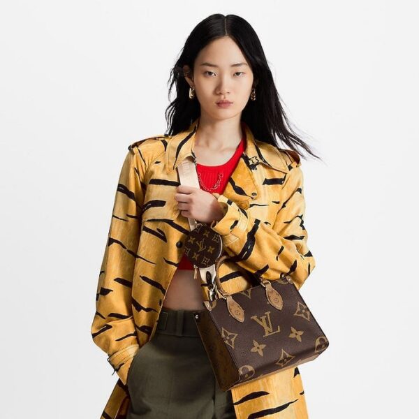 louis-vuitton-onthego-pm-monogram-canvas-handbags-M46373_PM1_Croppedwornview.jpg Louis Vuitton OnTheGo MM