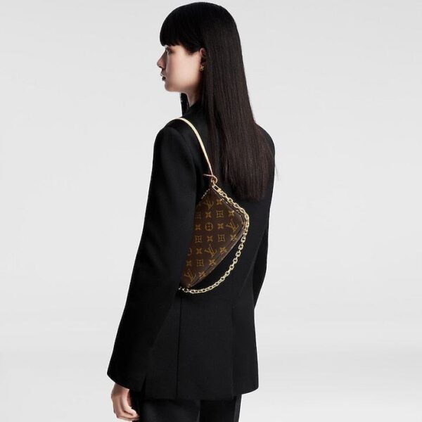 louis-vuitton-pochette-accessoires-monogram-wallets-and-small-leather-goods-M82766_PM1_Croppedwornview.jpg Louis Vuitton Pochette Accessoires