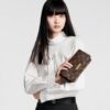 louis-vuitton-wallet-on-chain-lily-monogram-wallets-and-small-leather-goods-M82509_PM1_Croppedwornview.jpg Louis Vuitton Wallet On Chain Lily