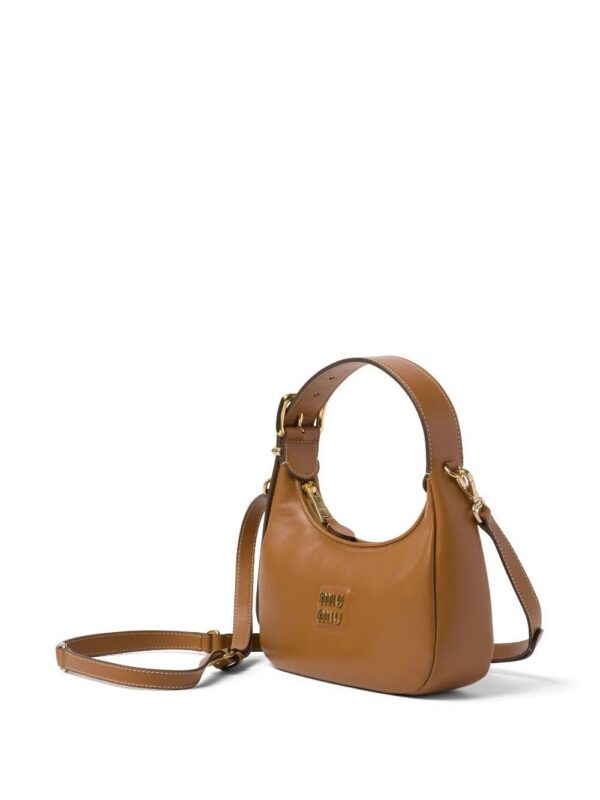 21230911_51104680_1000.jpg Miu Miu logo-plaque leather shoulder bag