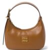21230911_51104682_1000.jpg Miu Miu logo-plaque leather shoulder bag