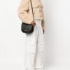 21293847_51252039_1000.jpg DKNY logo-lettering leather crossbody bag
