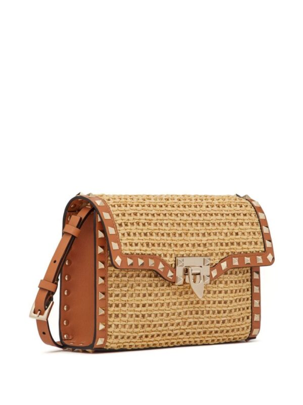 21676747_52141832_1000.jpg Valentino Garavani small Rockstud raffia shoulder bag