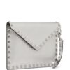 21678004_51827876_1000.jpg Valentino Garavani Rockstud metallic clutch bag