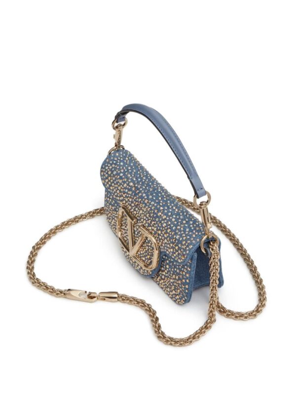Valentino Garavani small Locò studded denim shoulder bag