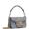 Valentino Garavani small Locò studded denim shoulder bag