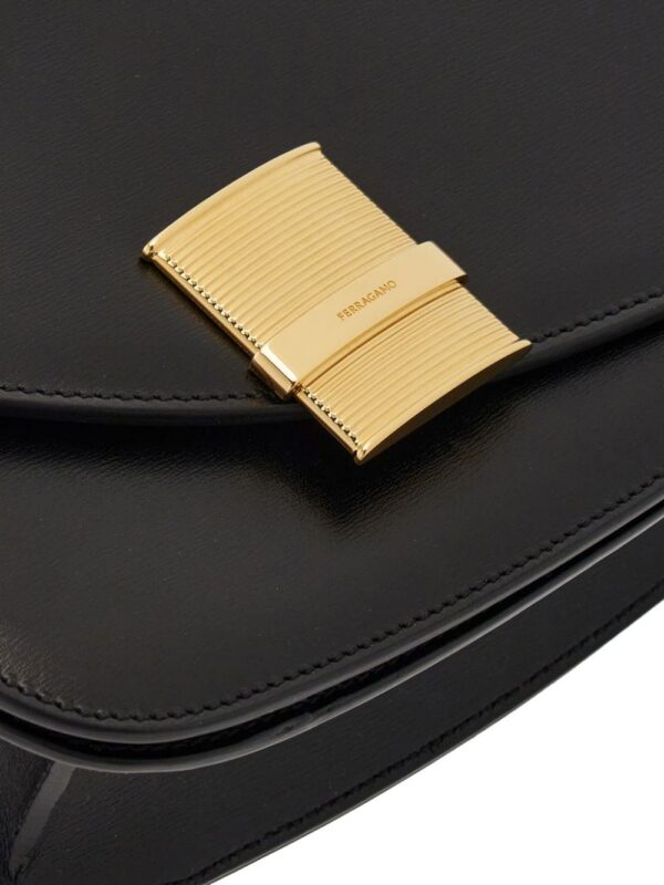 21832418_51717006_1000.jpg Ferragamo small Asymmetric leather crossbody bag