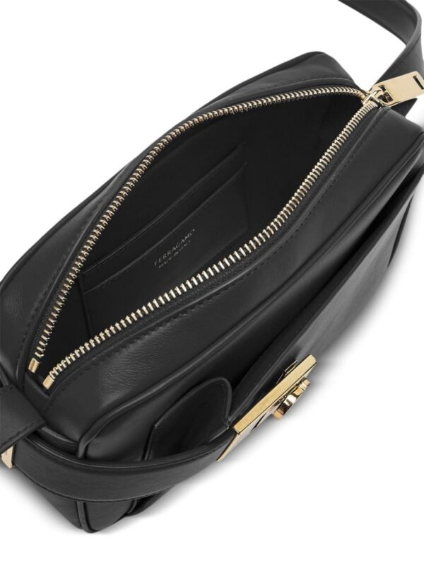 21834189_52055654_1000.jpg Ferragamo Gancini-buckle leather crossbody bag