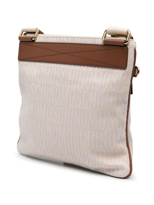 21851096_51698171_1000.jpg Moschino monogram-jacquard crossbody bag