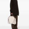 21891294_51689133_1000.jpg Stella McCartney faux-shearling tote bag