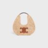 112772EYR-02NT_1_SUM23_87ac4977-d0f1-42cf-904b-81d61756fb37.jpg CELINE celine classic panier HOBO BAG IN Raffia and Calfskin