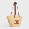 114342FF7-04LU_2_SS24_P1_W_3d09fa3c-099a-45d2-bb5e-b1a78f5a8c28.jpg CELINE MEDIUM SUPPLE CELINE CLASSIC PANIER IN Raffia and calfskin