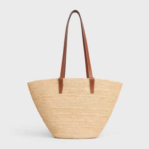 114342FF7-04LU_3_SS24_P1_W_b1d66301-ab40-4c4a-ade3-6c76a000427e.jpg CELINE MEDIUM SUPPLE CELINE CLASSIC PANIER IN Raffia and calfskin