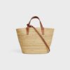 115802FF7-04LU_3_SS24_P1_W.jpg CELINE TEEN SUPPLE CELINE CLASSIC PANIER IN Raffia and calfskin