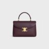 117523FXK-28DG_1_FALL25_W.jpg CELINE MEDIUM NINO BAG IN SUPPLE GRAINED CALFSKIN