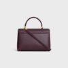 117523FXK-28DG_3_FALL25_W_ea093fbc-1816-43dd-a796-7f734f077775.jpg CELINE MEDIUM NINO BAG IN SUPPLE GRAINED CALFSKIN