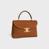 117523GR5-02CM_2_FALL25_W_a4c259b0-2d2a-45a6-bf6d-b23e871de6f2.jpg CELINE MEDIUM NINO BAG IN NUBUCK CALFSKIN