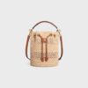 117862FX8-04LU_1_SS24_P2_W.jpg CELINE CLARA CELINE CLASSIC PANIER in RAFFIA AND CALFSKIN