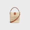 119742GNS-02NT_4_SUM25_W_d3b2030a-b00d-4cd6-9ced-0fbb6747887c.jpg CELINE SMALL LOUISE BUCKET IN RAFFIA AND CALFSKIN