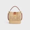 123152GUJ-02NT_1_FALL25_W_7a77cf25-e56f-479a-a8b1-676c34f798b5.jpg CELINE MEDIUM LOUISE BUCKET IN RAFFIA AND CALFSKIN