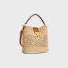 123152GUJ-02NT_2_FALL25_W_b6cd6c10-483e-40ca-b575-884df0403449.jpg CELINE MEDIUM LOUISE BUCKET IN RAFFIA AND CALFSKIN