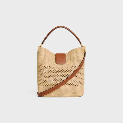 123152GUJ-02NT_3_FALL25_W_0e77214e-7b98-4d5f-aee7-5aab2e4b8e99.jpg CELINE MEDIUM LOUISE BUCKET IN RAFFIA AND CALFSKIN