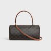 123882GQC-04LU_3_WIN25_W_V1_db99cf9f-cb99-4487-b6d6-80e235fad88e.jpg CELINE CYLINDER BAG IN Triomphe canvas and calfskin