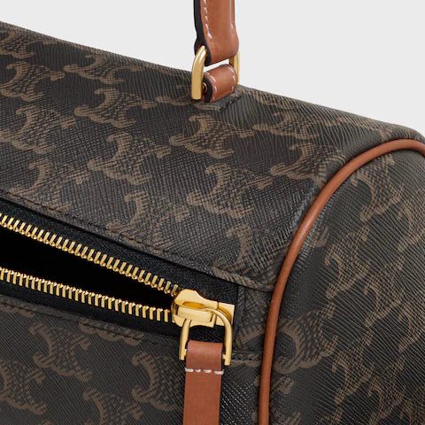 123882GQC-04LU_4_WIN25_W_V1_240bd058-d621-4838-b787-f8b3d9fd615e.jpg CELINE CYLINDER BAG IN Triomphe canvas and calfskin