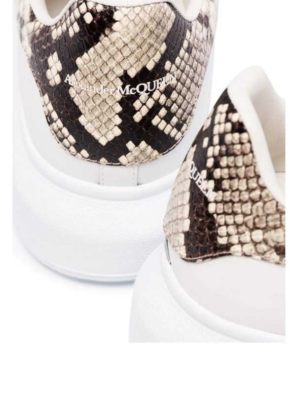 13951746_21704095_1000-1.jpg Alexander McQueen Oversized contrast heel counter sneakers