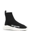 16256576_31151274_1000_5201a250-0e2c-425c-a4b7-ef4a5b018355.jpg Love Moschino logo print slip-on sneakers