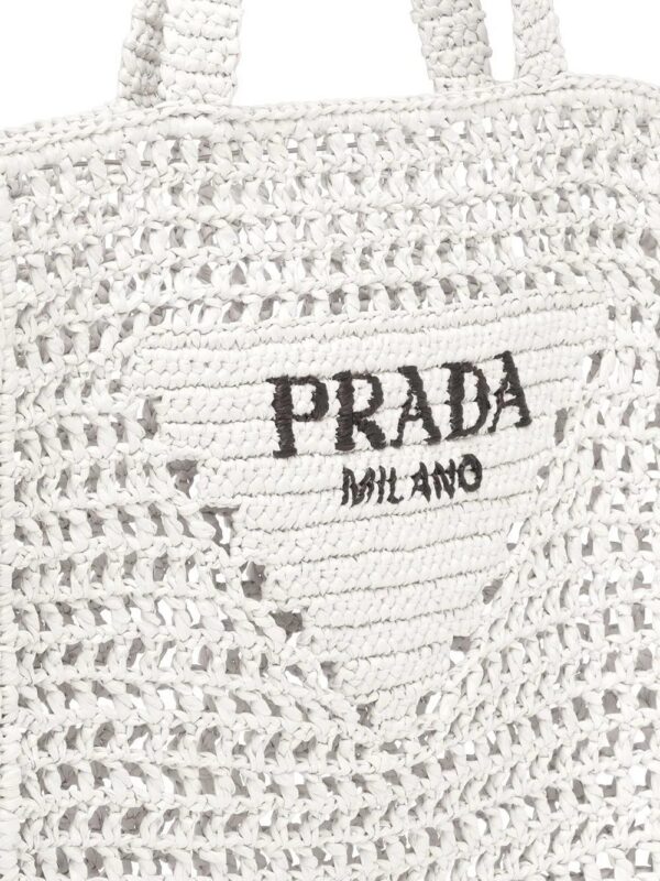 16763010_33124589_1000.jpg Prada logo-print raffia tote bag