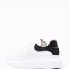 17000502_33949456_1000-1.jpg Alexander McQueen Oversized studded low-top sneakers