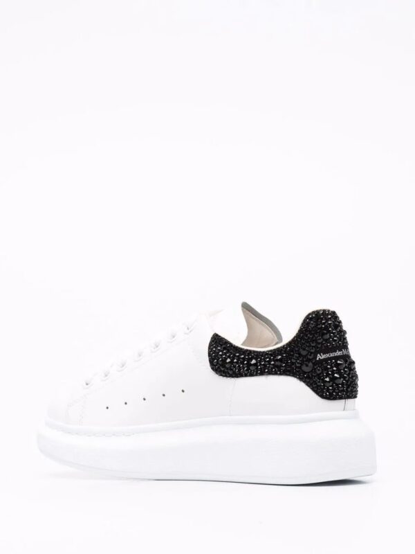 17000502_33949456_1000-1.jpg Alexander McQueen Oversized studded low-top sneakers