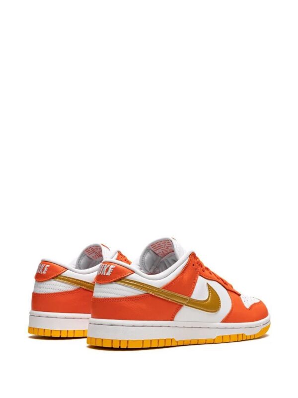 17693068_37062677_1000-1.jpg Nike Dunk Low “University Gold” sneakers