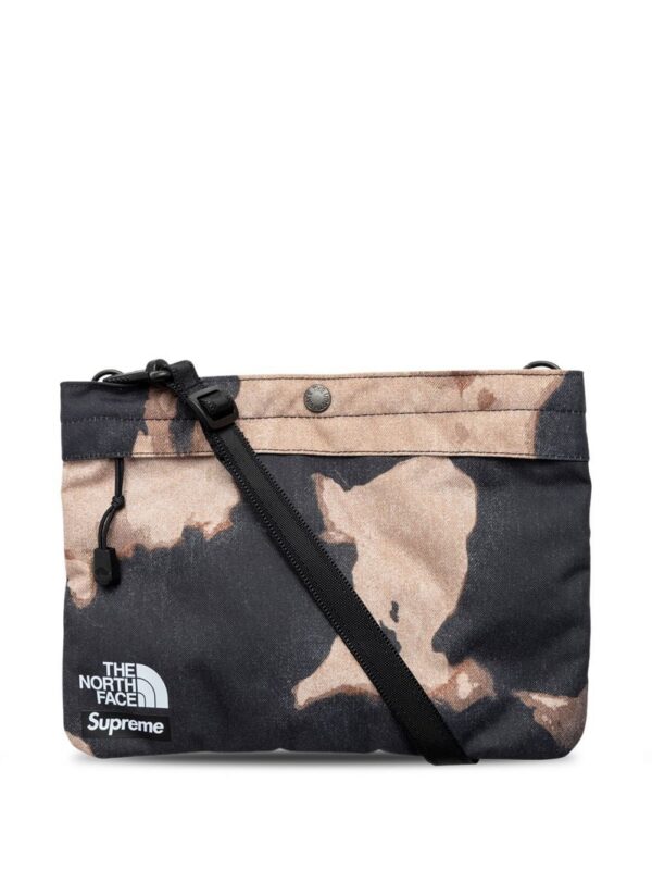 Supreme  x The North Face bleached denim print shoulder bag
