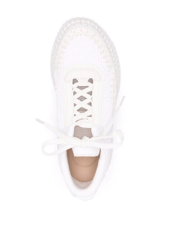18089234_38351956_1000.jpg Chloé waffle-knit whipstitch-trim sneakers
