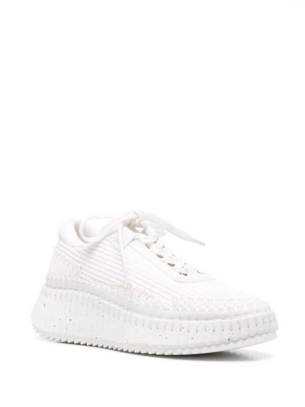 18089234_38353211_1000.jpg Chloé waffle-knit whipstitch-trim sneakers