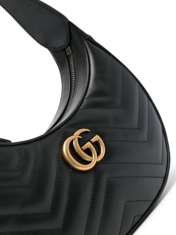 18298996_53148040_1000.jpg Gucci mini GG Marmont half-moon shoulder bag