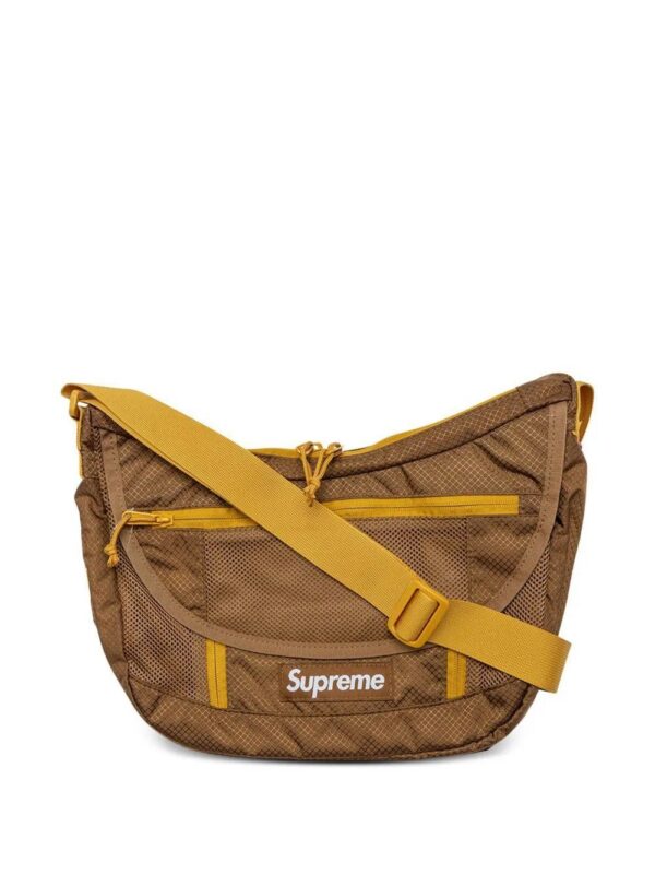 18302679_39821049_1000_cb2b2428-3ec7-4d42-ae4d-b9920334ec93.jpg Supreme logo-patch messenger bag